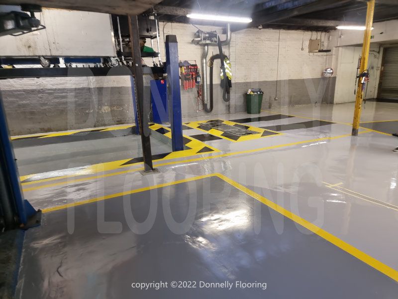 Walton Garage Enfield resin flooring refurbishment - top coat