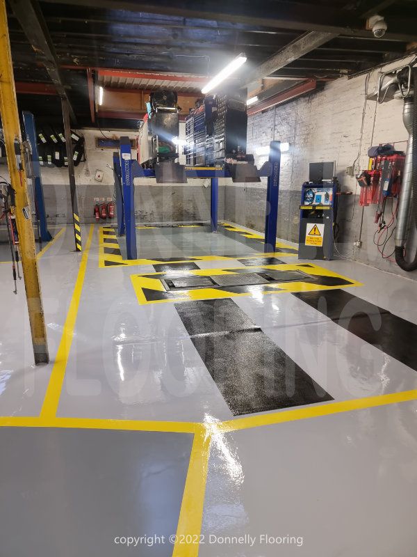 Epoxy Resin flooring refurbishment project - Walton Garage Enfield