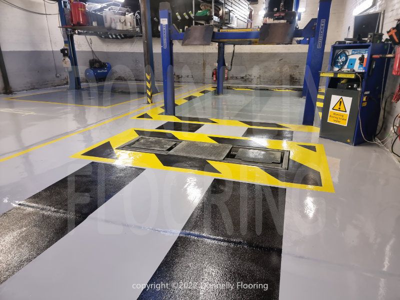 Walton Garage Enfield resin flooring refurbishment - top coat