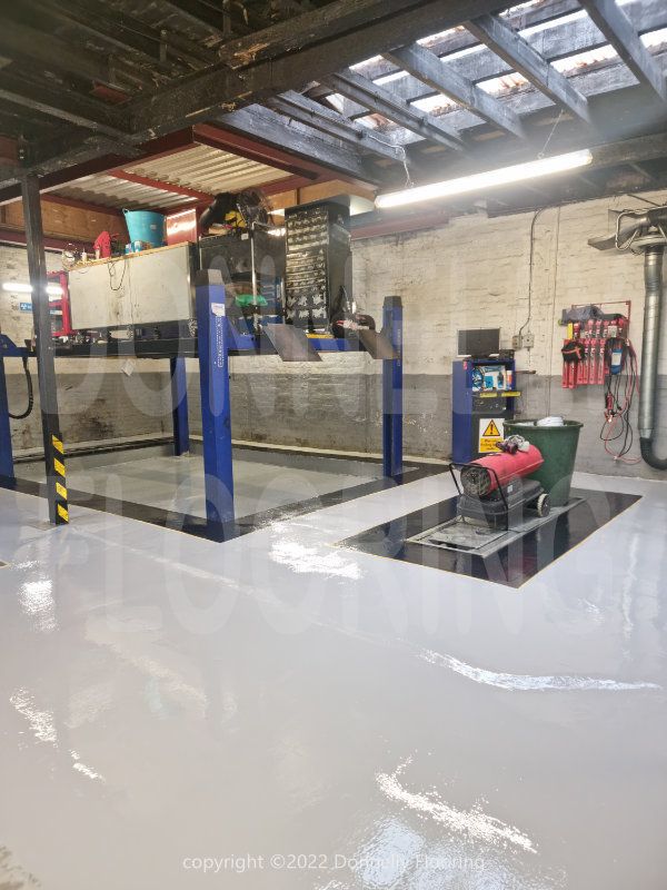 Walton Garage Enfield resin flooring refurbishment - top coat