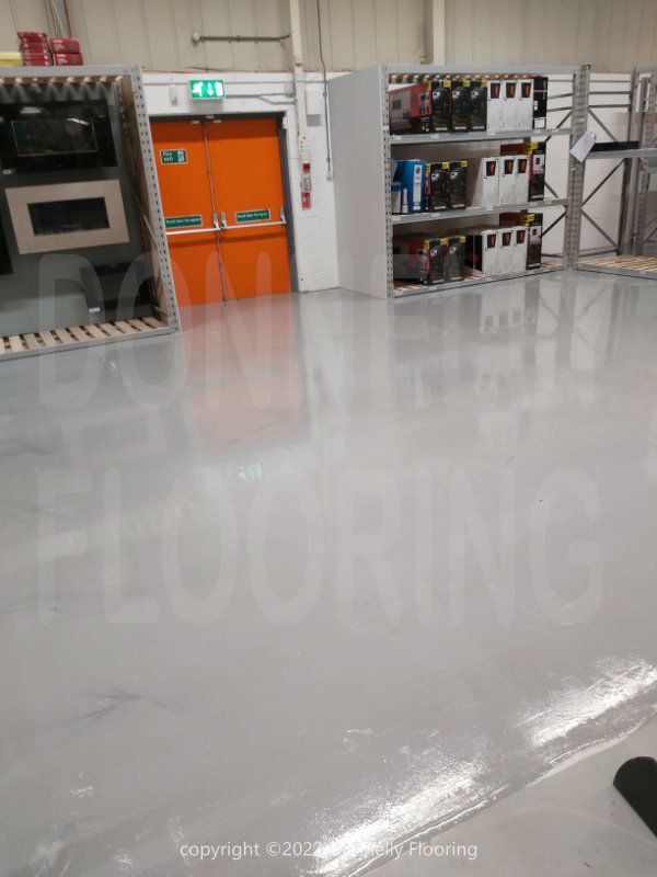 Epoxy Resin flooring refurbishment project - B&Q Warehouse
