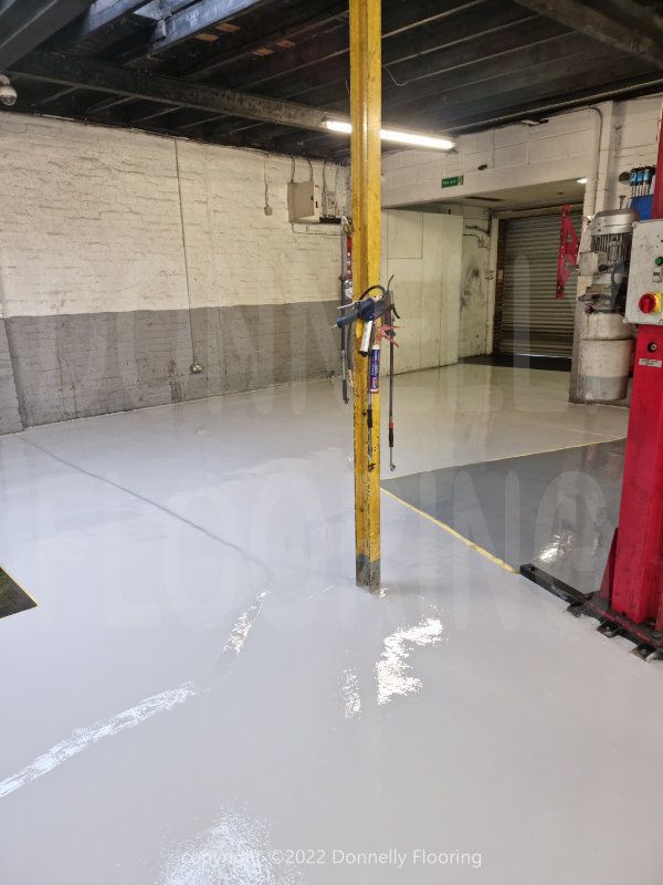 Walton Garage Enfield resin flooring refurbishment - top coat