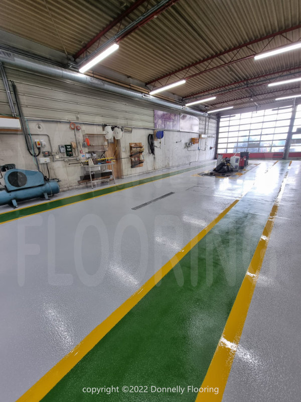 East Midlands Airport airside resin flooring refurbishment - top coat