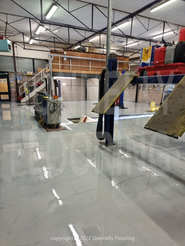 East Midlands Airport resin flooring refurbishment - top coat