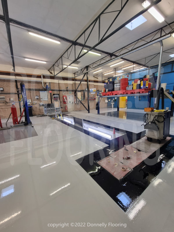 East Midlands Airport resin flooring refurbishment - top coat