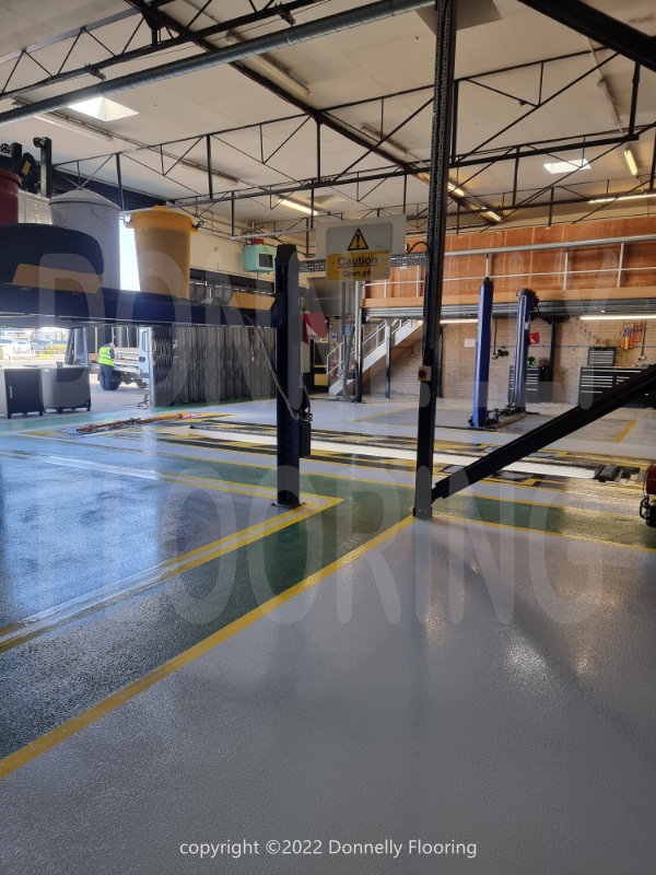 East Midlands Airport resin flooring refurbishment - top coat
