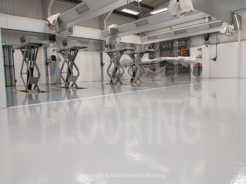 Lamborghini resin flooring refurbishment - top coat