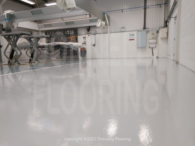Lamborghini resin flooring refurbishment - top coat